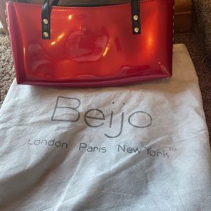 Beijo red handbag.